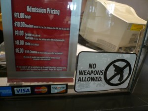 AMC Theatres: No Weapons Allowed, Courtesy of gruntzooki via Flickr